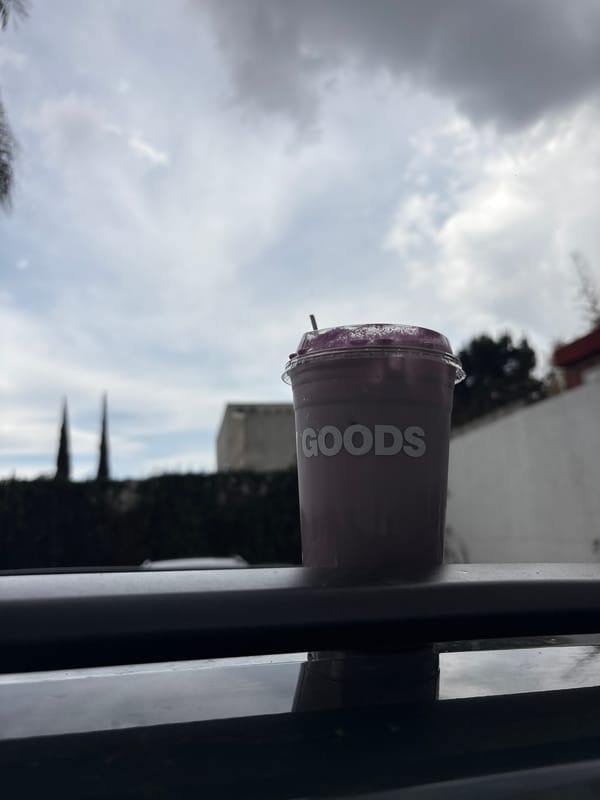 Purple drink in branded cup spotted on Puebla ledge