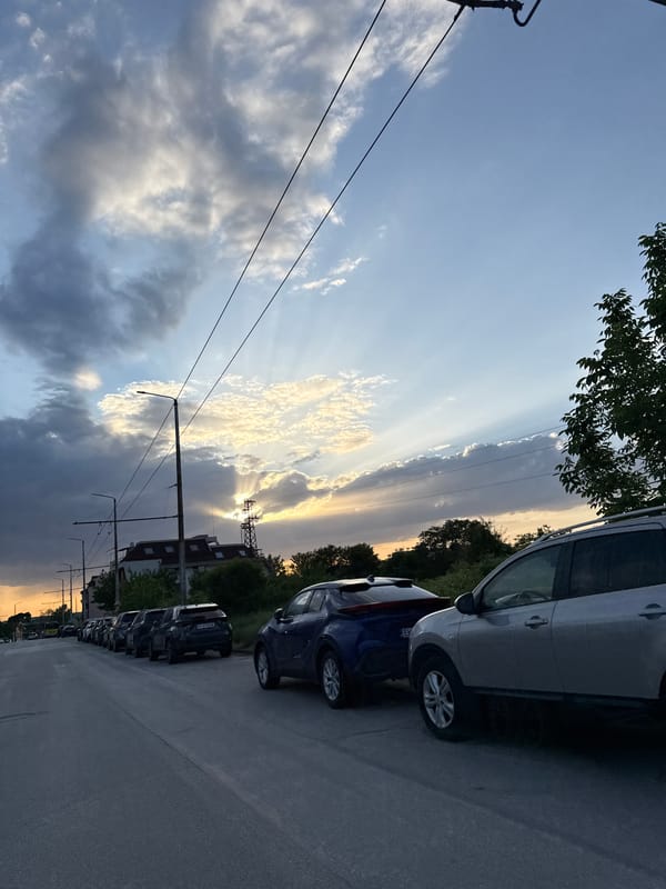 Sunset documented on Pleven street with dramatic cloudy sky