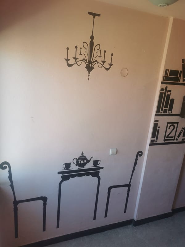 Decorative stencil artwork spotted on interior wall in Blagoevgrad