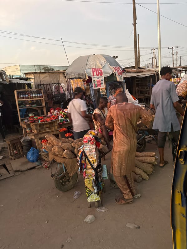 Street vendors conduct evening business in Agbara, Nigeria