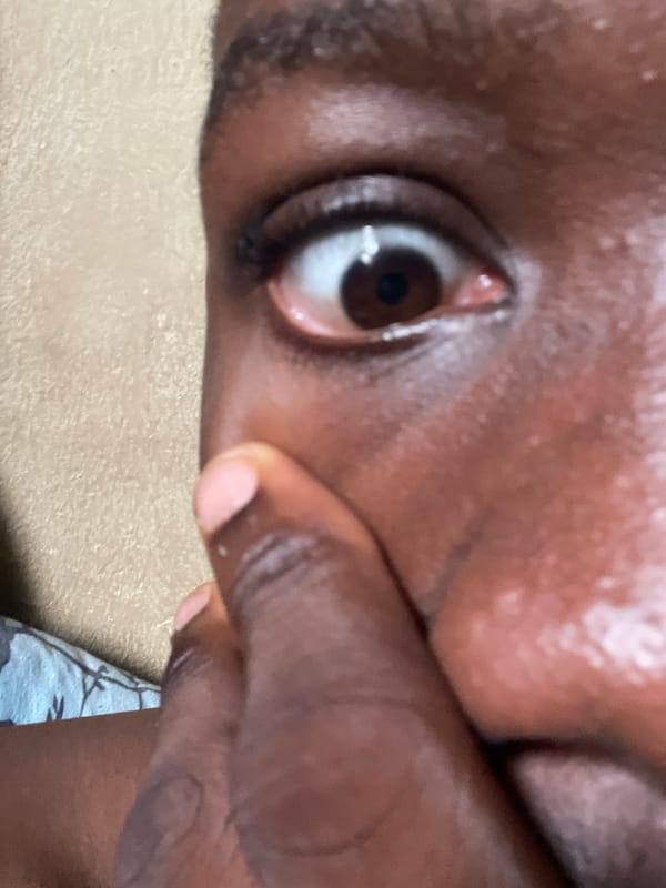 Eye close-up and a casual text graphic from Nigeria