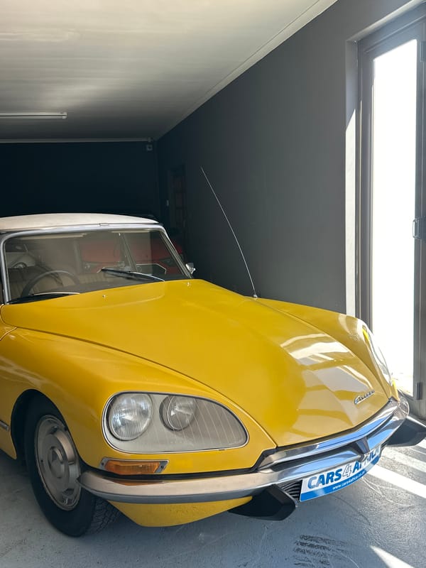 Vintage car garage activity documented in Cape Town
