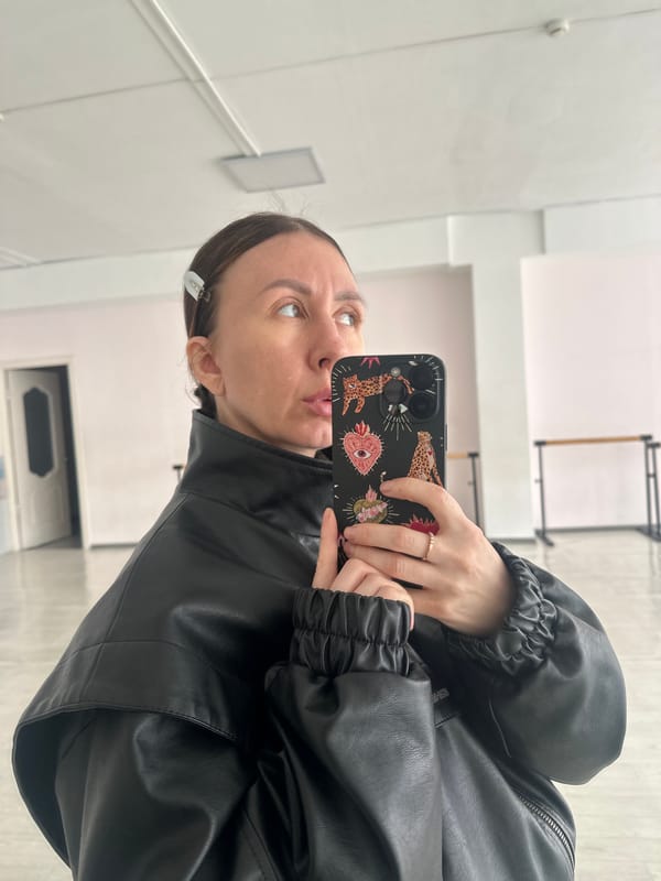 Woman takes selfies in dance studio in Votkinsk