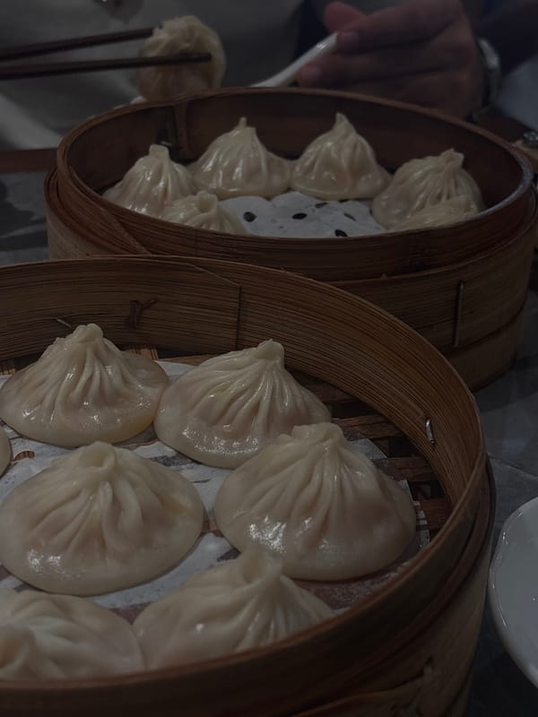 Morning documentation captures dumplings, camera settings, turntable in Shanghai