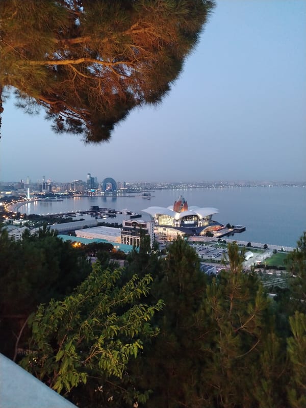 Baku Boulevard at dusk, Caspian coastline in view