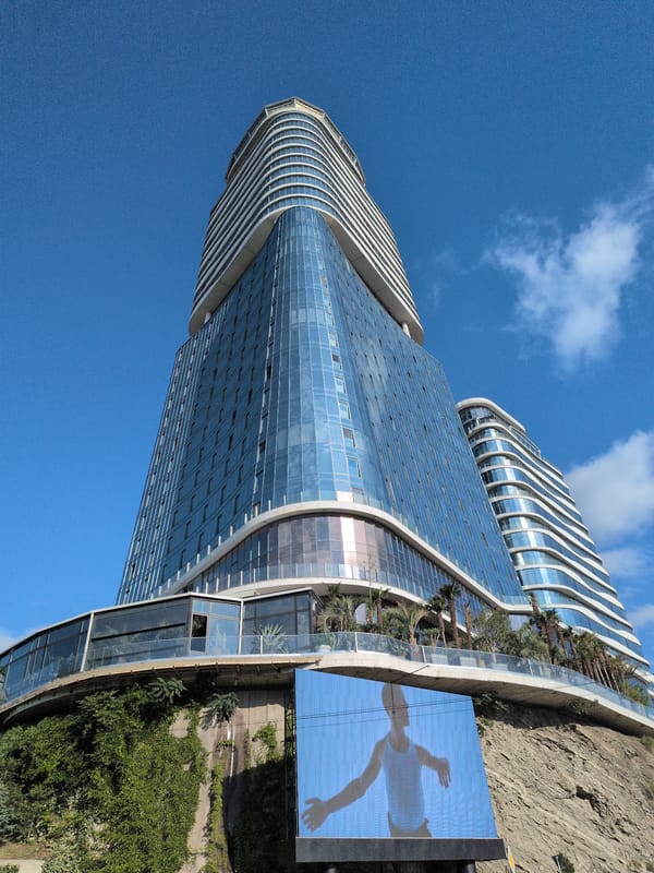 Looking up at Tbilisi's modern glass architecture