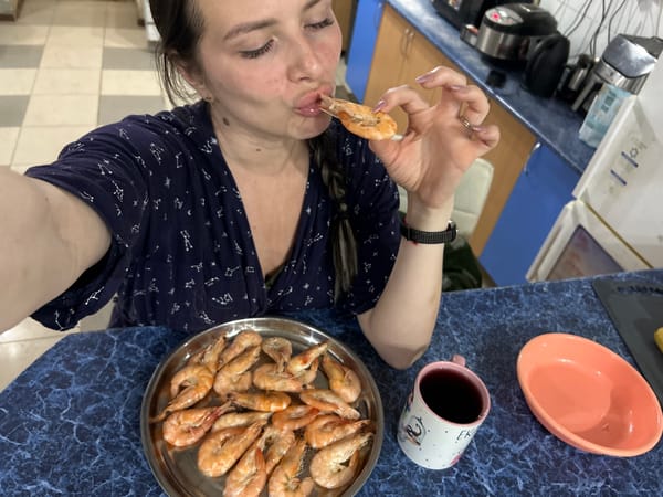 Russian resident documents evening shrimp meal with personalized mug