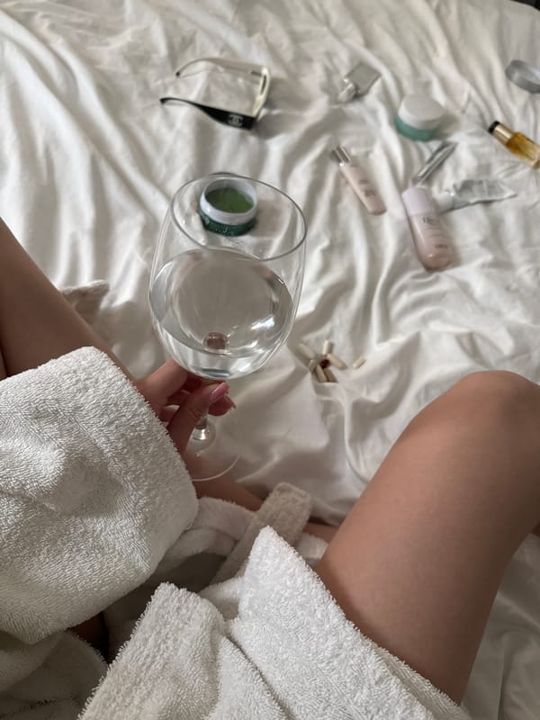 Sofia resident documents morning beauty routine with wine, skincare