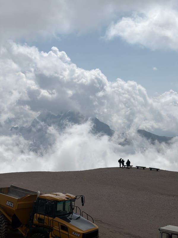 Cloudy morning on the Zugspitze with a small group exploring the summit