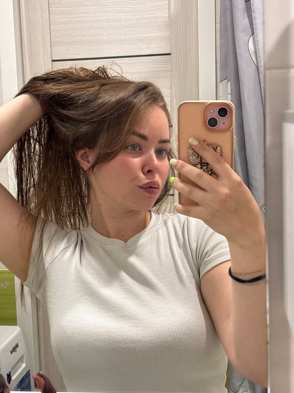 Woman takes early morning selfies in Izhevsk apartment