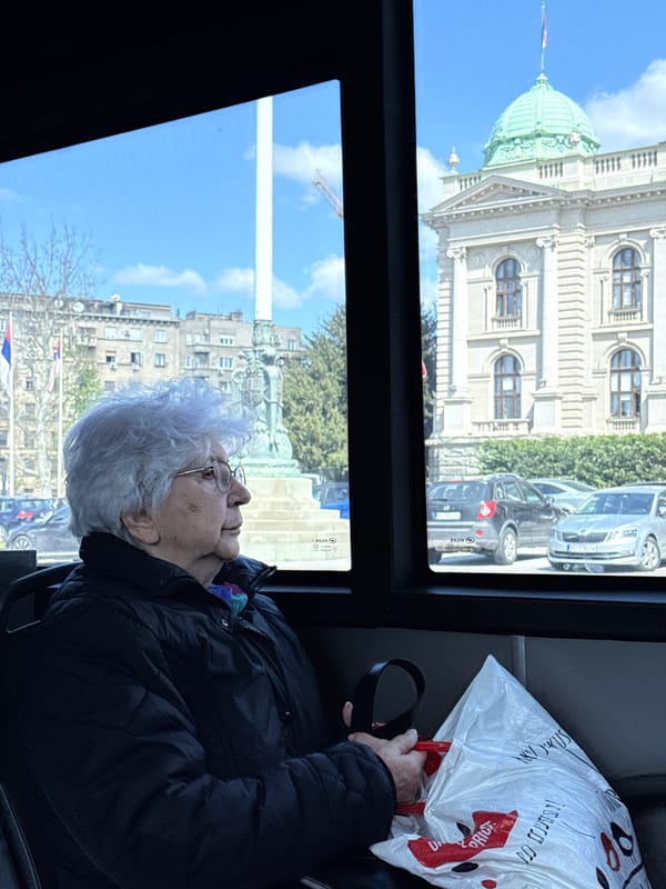 Elderly woman observed on Belgrade public transport