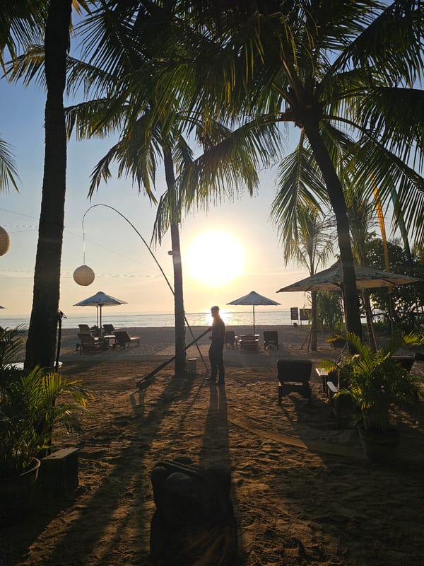 Sunset watchers gather on Denpasar beaches during golden hour