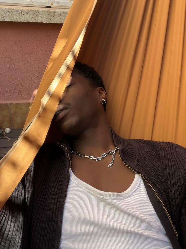Person relaxes in hammock on Barcelona patio morning