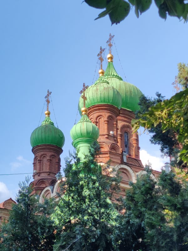 Alexander Nevsky Cathedral and aged brick architecture in Krasnodar