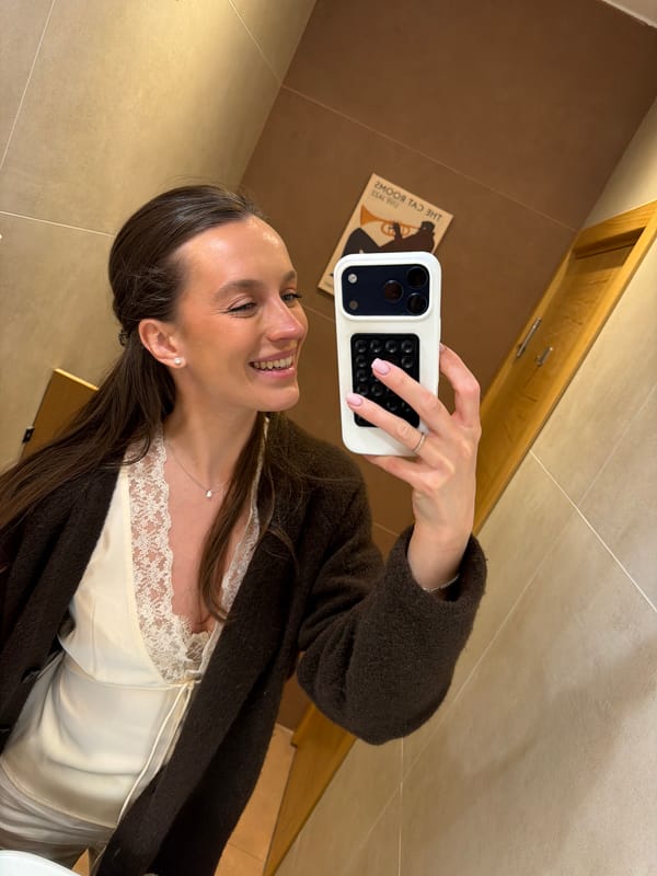 Woman takes selfies in bathroom and restaurant in Tivat