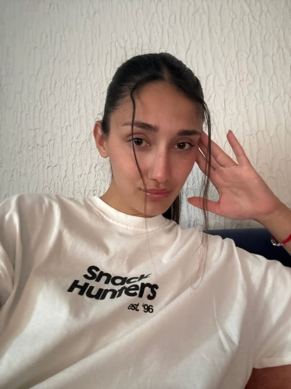 Woman takes selfie indoors in Sutomore, Montenegro
