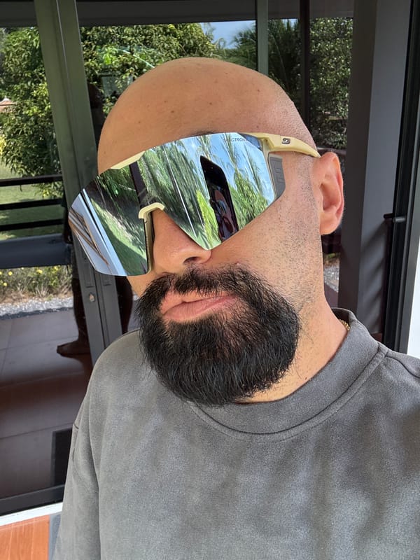 Sunglasses try-on session on a Ko Samui balcony