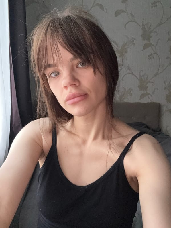Woman takes morning selfies in Rostov-on-Don apartment