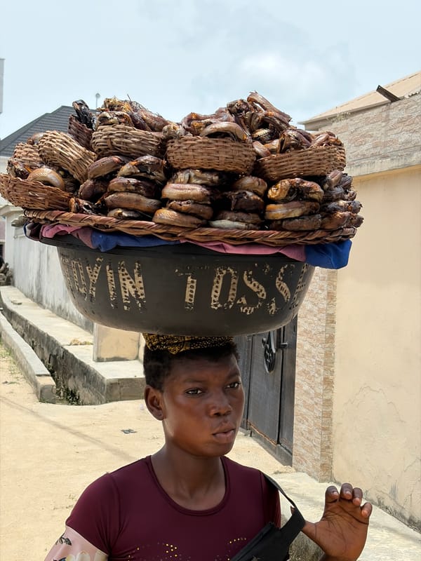 Street vendors, delivery workers conduct daily business in Nigerian towns