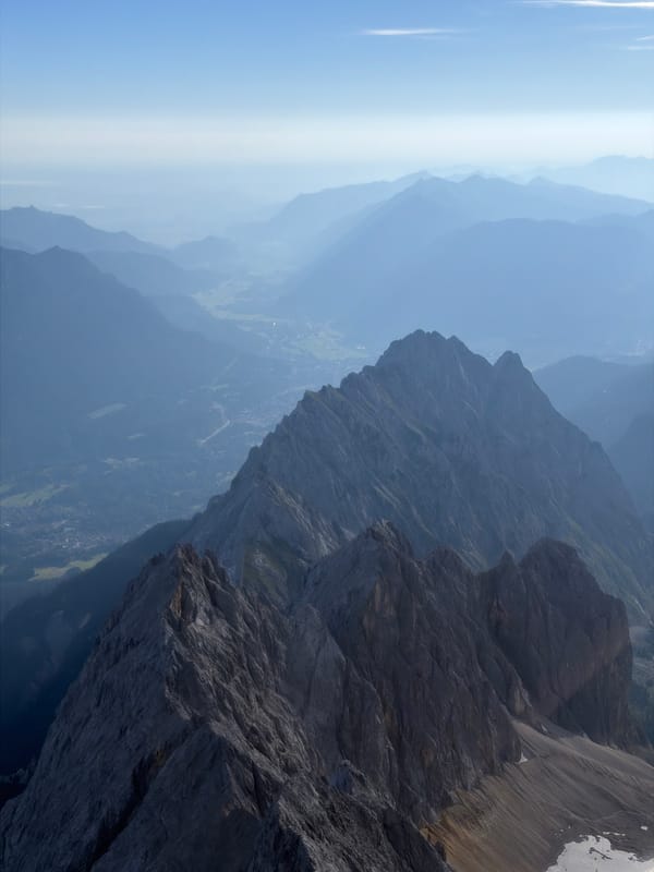 Cable car ride up rocky alpine peaks above Grainau