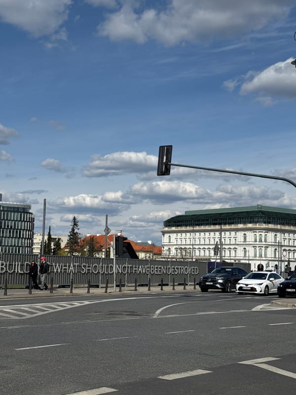 Warsaw street scenes captured, including distinctive pink Barbie car