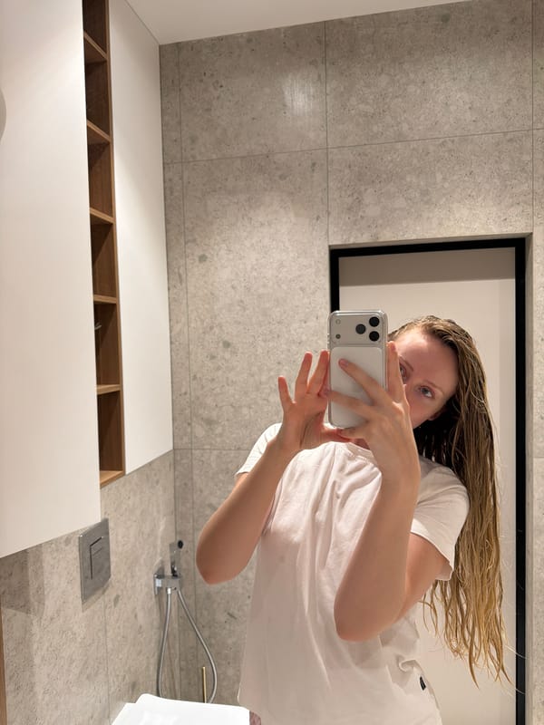 Morning at home in Chișinău: bathroom selfie and a sleepy pug
