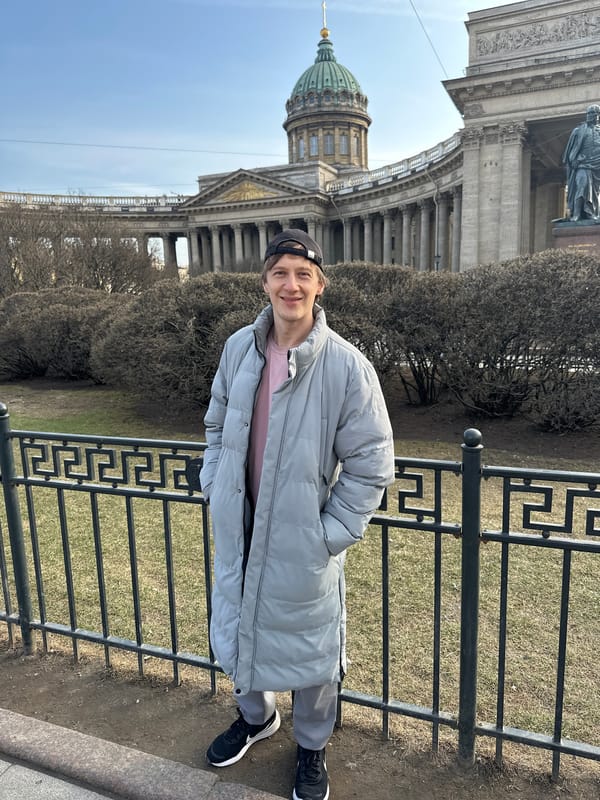 Tourists photograph themselves at Saint Petersburg's Kazan Cathedral