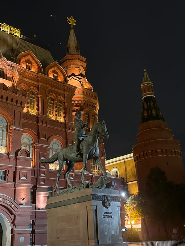 Red Square at night: monuments, museums, and fountains glowing