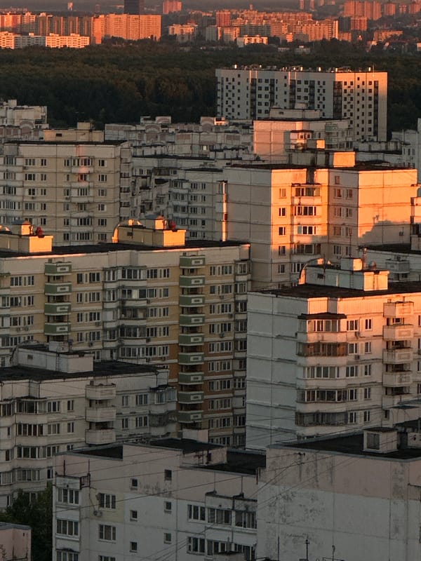 Moscow apartment blocks photographed from multiple angles at sunset