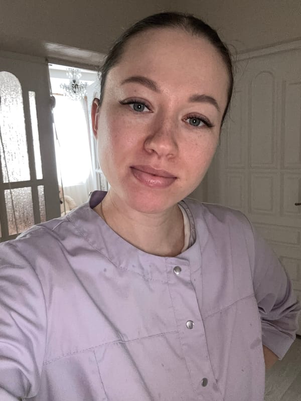 Woman takes morning selfie in Ferma, Russia home