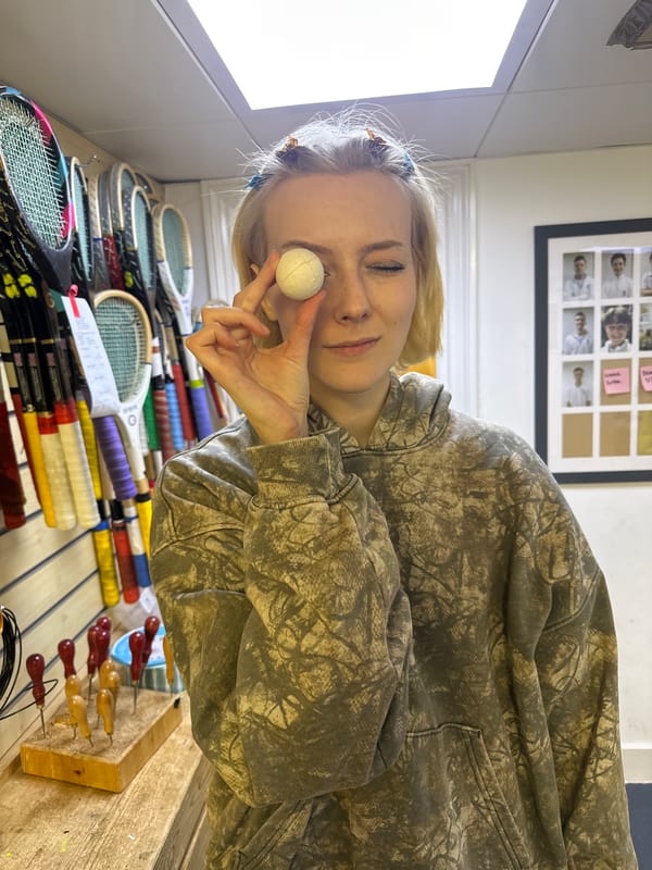 Woman crafts handmade ball in London sporting goods workshop