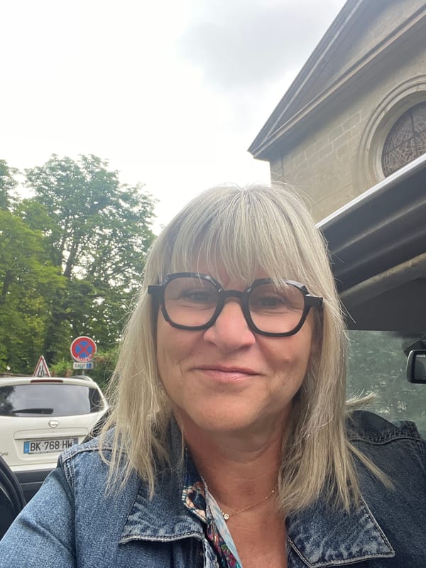 Woman takes multiple selfies around Saint-Étienne in morning