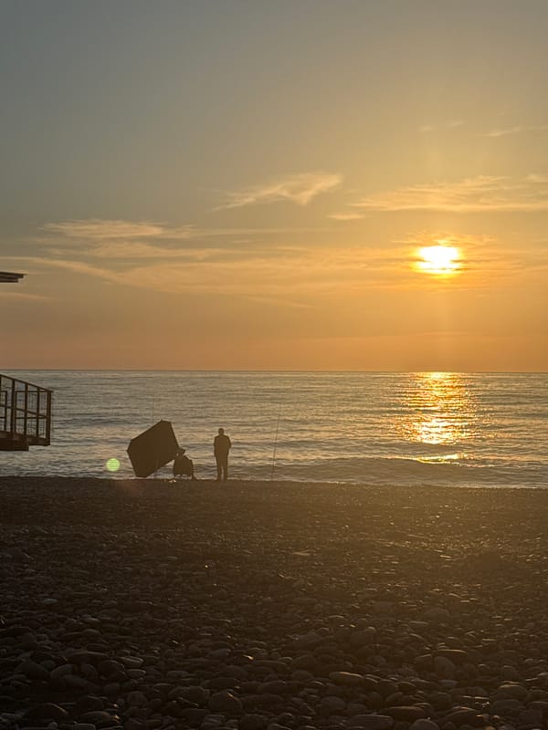 Sunset documented over Black Sea beach in Batumi, Georgia
