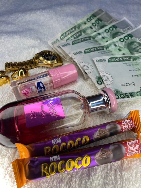 Flat lay photography session with Nigerian currency documented in Maigizo