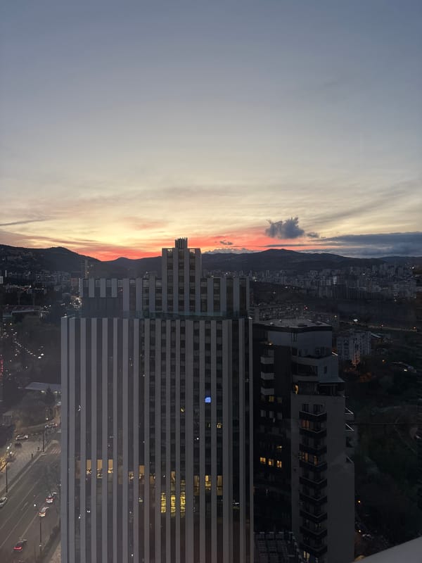 Sunset view captured over Tbilisi from elevated building position