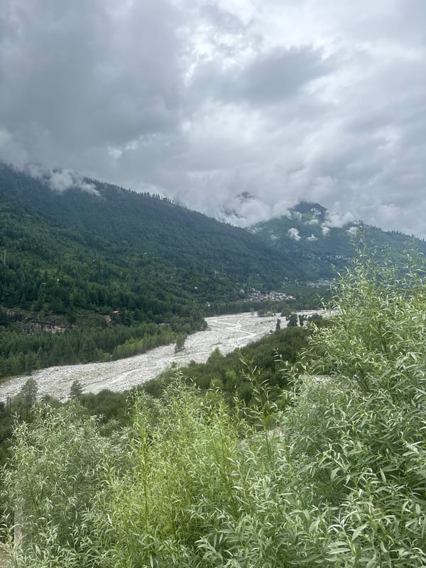Overcast valley and hillside town views in Vashisht, India