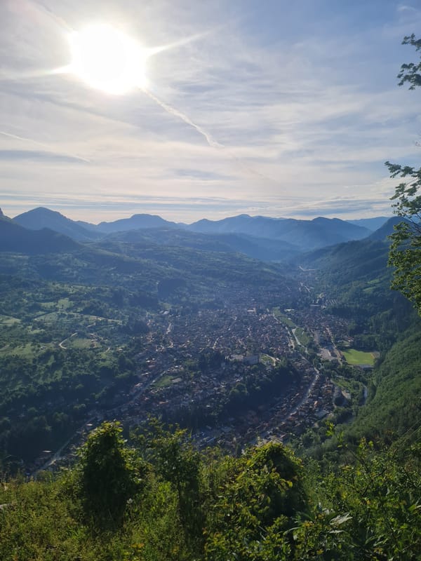 Aerial view captures sunlit Teteven nestled in Bulgarian mountains