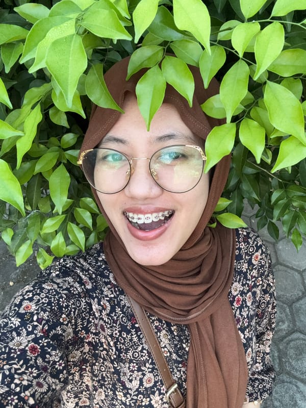 Woman poses for photos in Gadingrejo garden setting