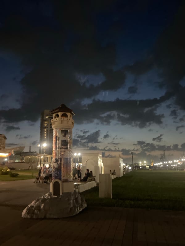 Decorative lighthouse tower at dusk in Sementsovka, Russia