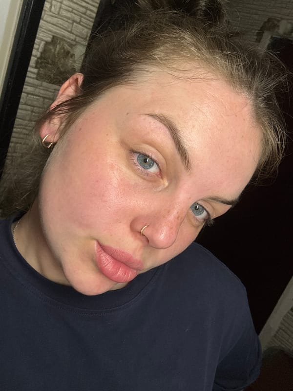 Woman takes selfies in Chornomorskoe bathroom mirror