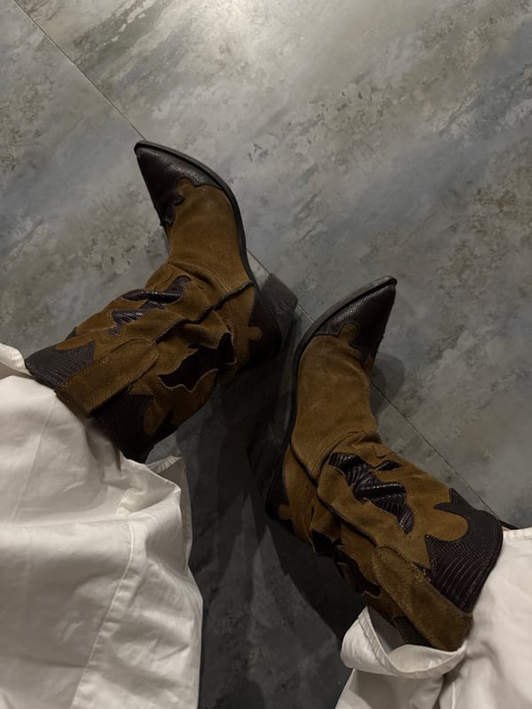 Evening vinyl session with cowboy boots in Yerevan apartment