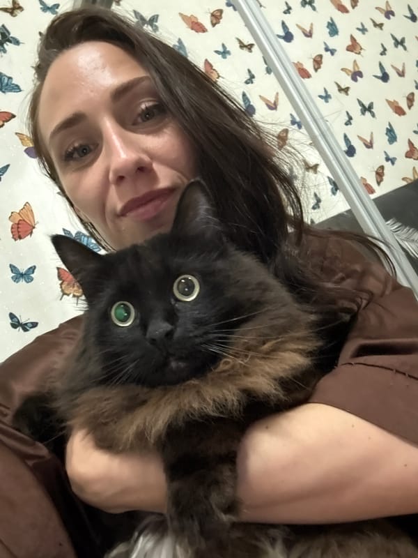 Afternoon bedroom selfies and black cat moments in Saint Petersburg