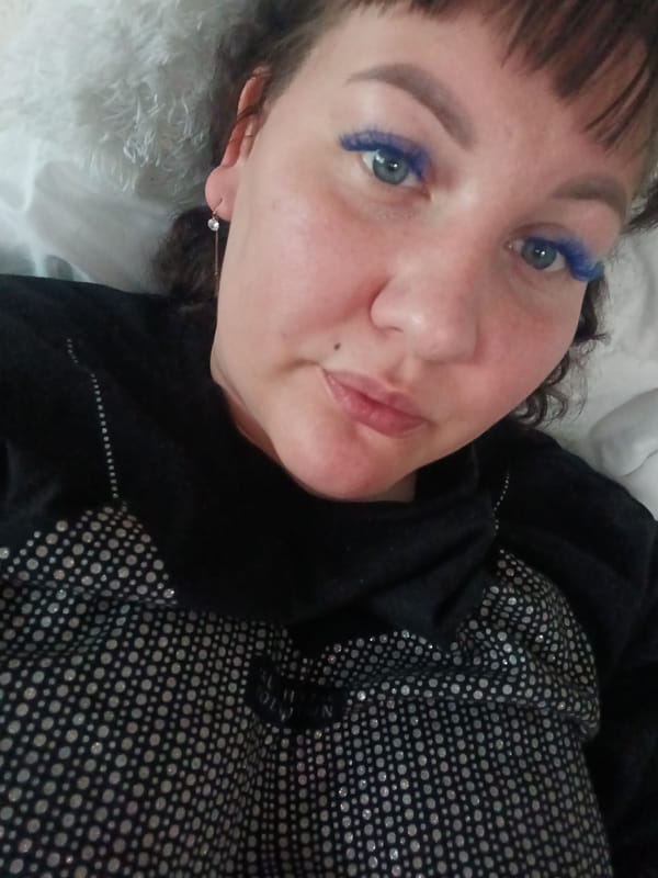 Woman with blue false eyelashes documented in Osa, Russia