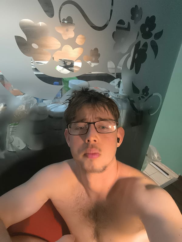 Young man takes multiple selfies in Sofia apartment