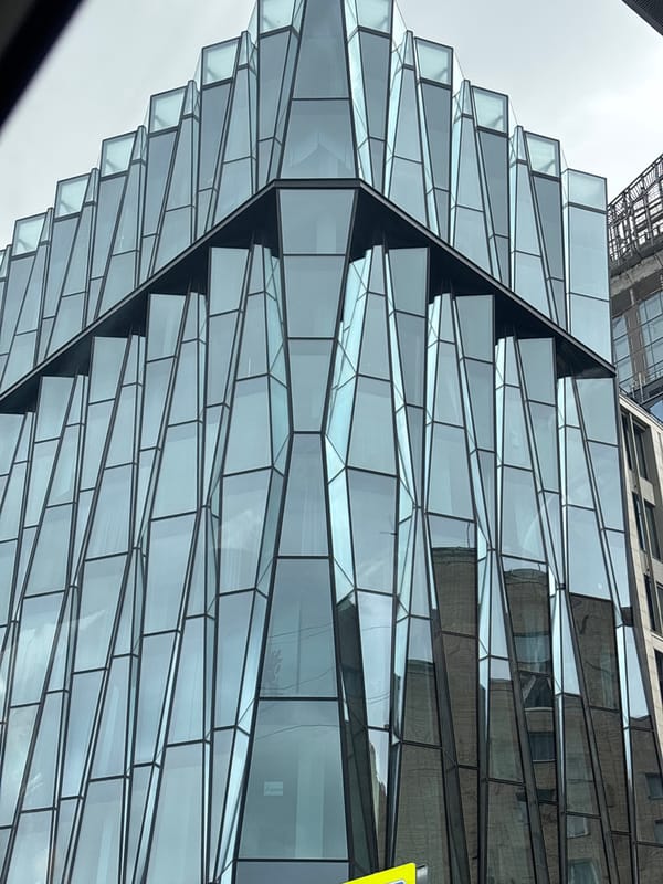 Moscow glass towers, one still mid-construction