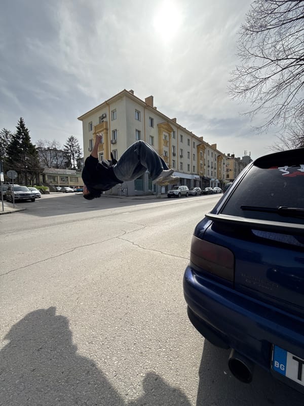 Man performs street acrobatics in downtown Shumen
