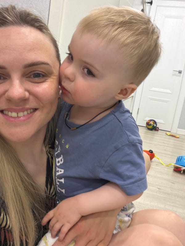 Mother, child, and dog share quiet moments in Votkinsk