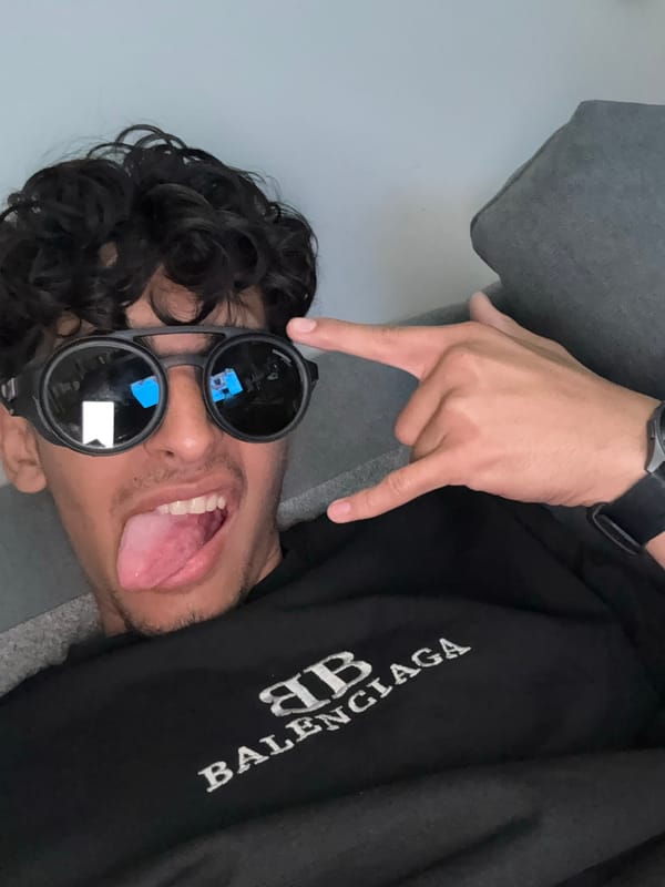 Young people hang out on couch in Bulgaria home