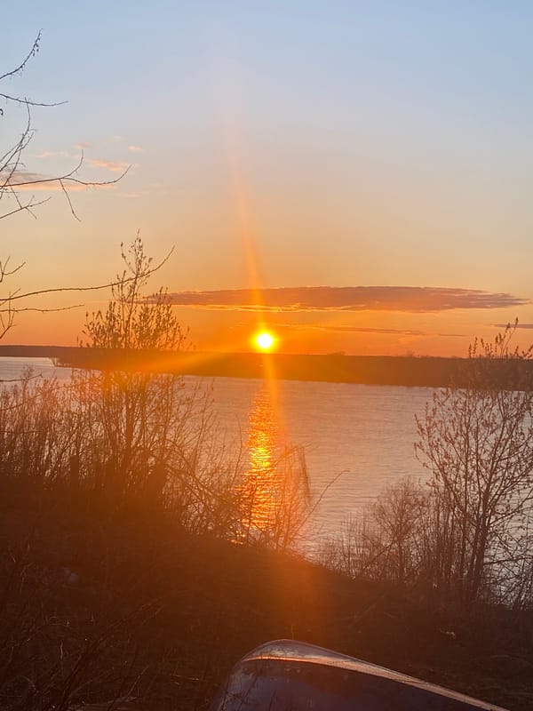 Sunset observed over water body in Ольховка, Russia
