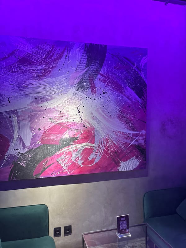 Indoor gaming setup and artwork captured in Indonesian residence